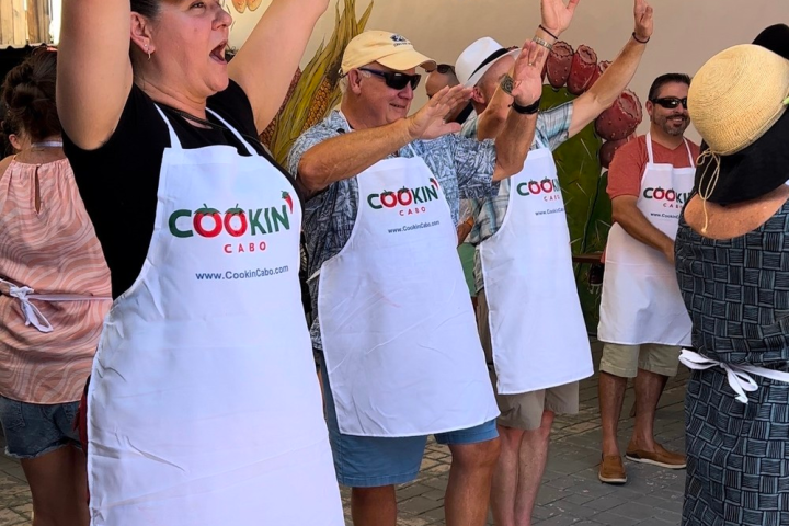 a group of people standing in front of a crowd